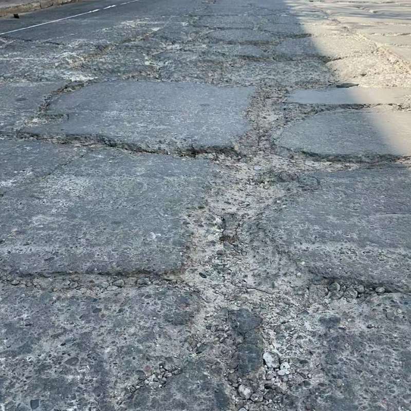 永兴路面起砂露石子修补料